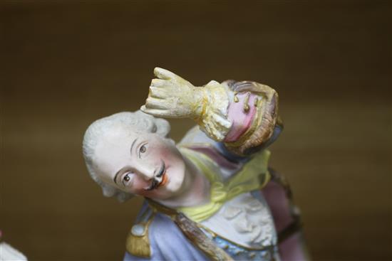 A pair of coloured bisque figures